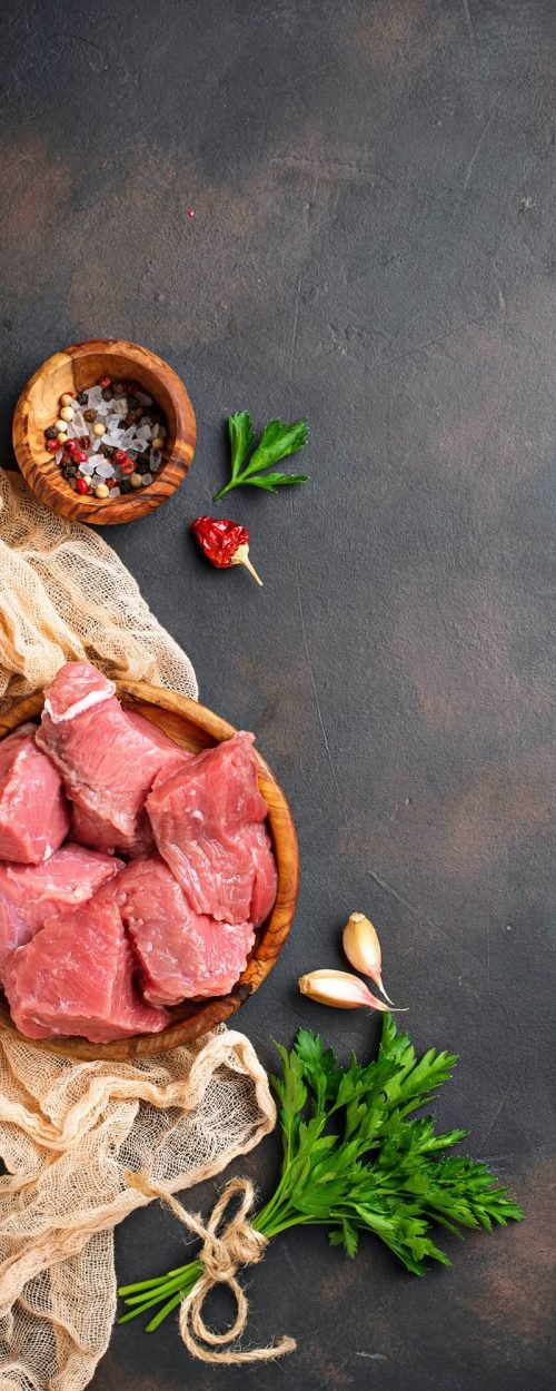 raw-chopped-meat-with-spices-on-rusty-background.jpg
